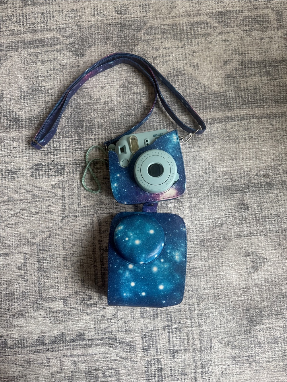 Fujifilm Instax Camera with Galaxy Blue Case and Strap